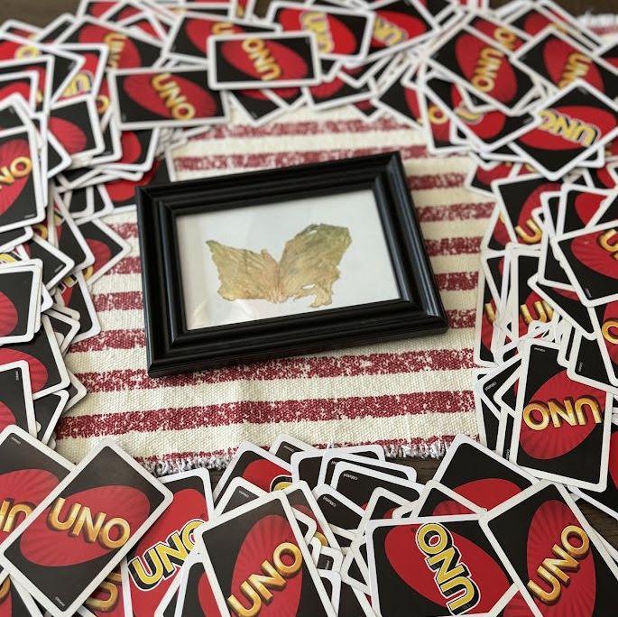 We love game nights and one of our favorite games to play is a house-rules version of UNO we call Floorno (floor uno). The framed piece of lettuce is required.