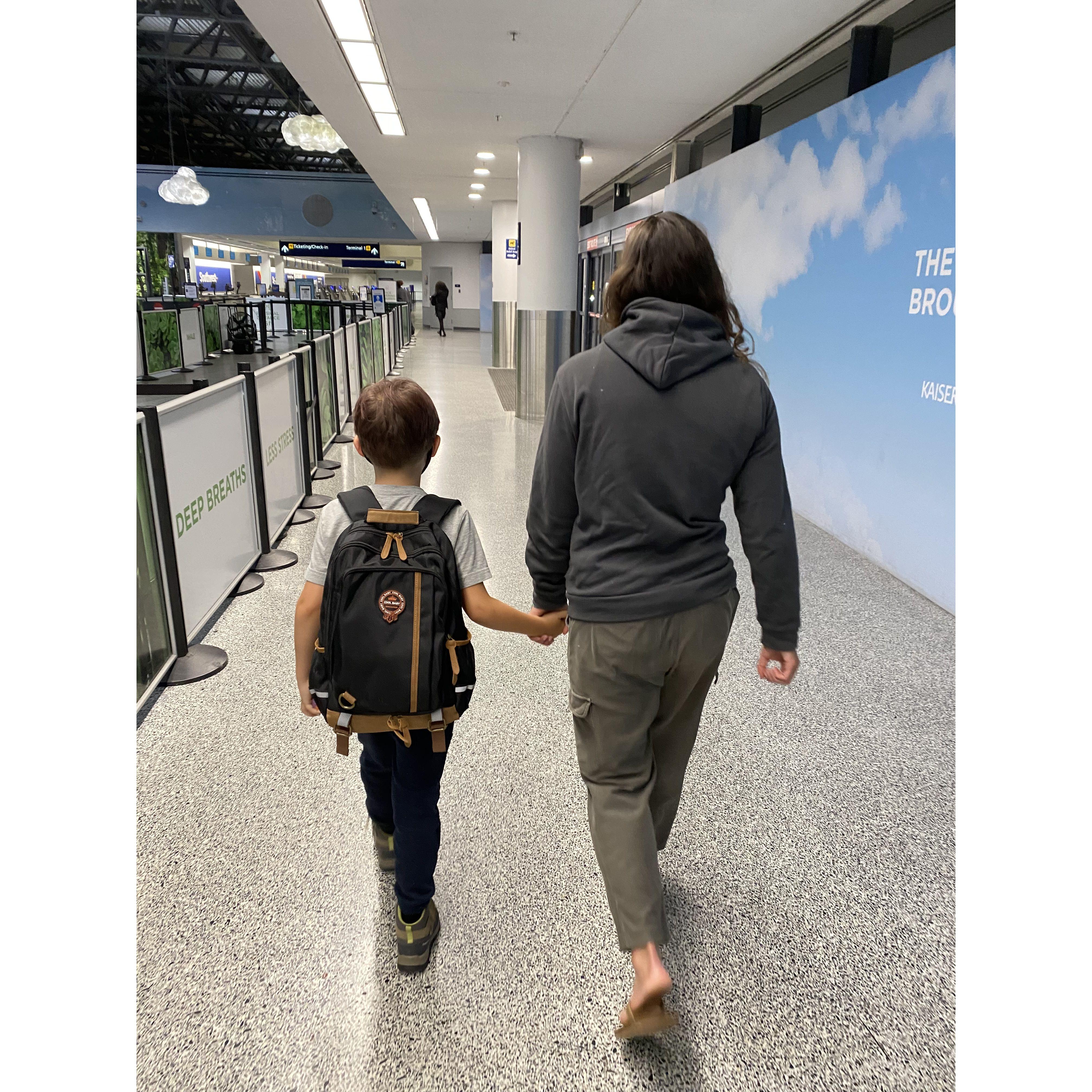 Becca welcoming Ryan after his flight back to Oakland