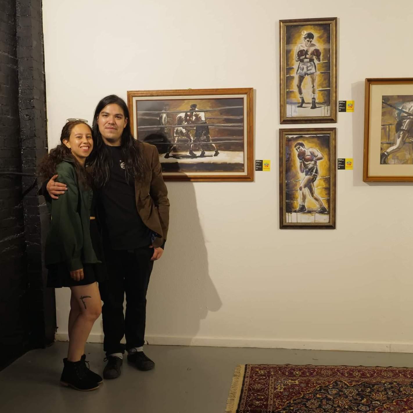 Emmanuel's paintings on display. 2021
