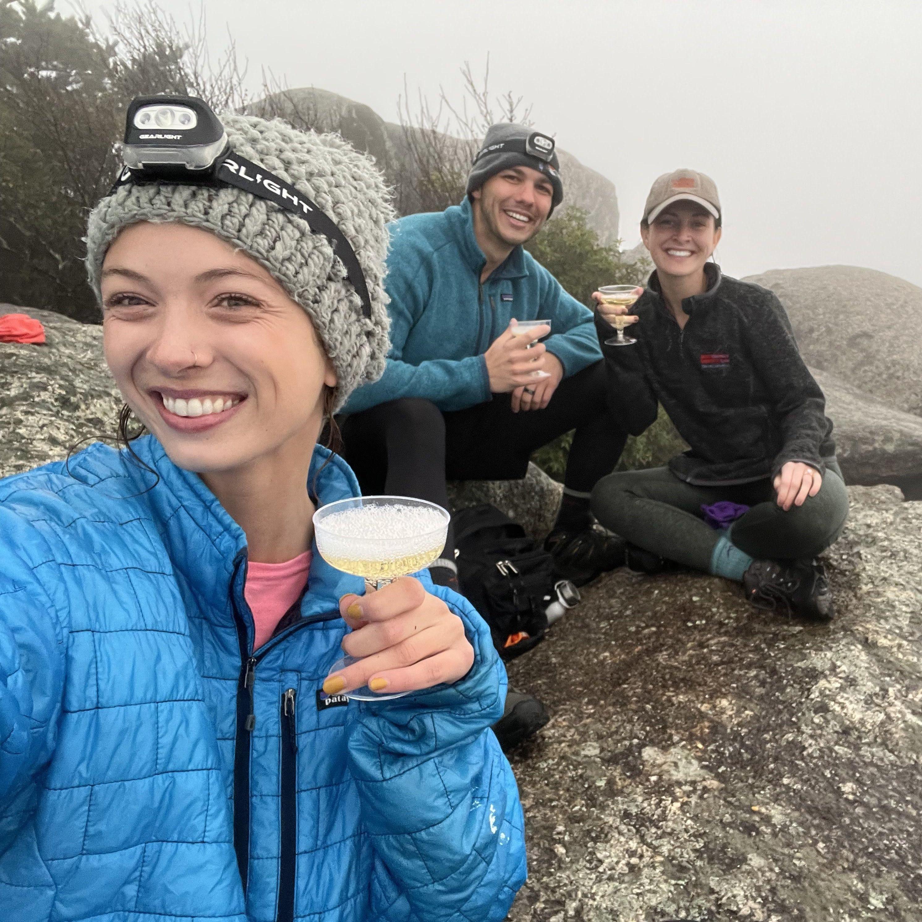 hiking up the  mountain: "what do you have in this backpack- rocks?!" No, it turns out a bottle of champagne to celebrate the best surprise!