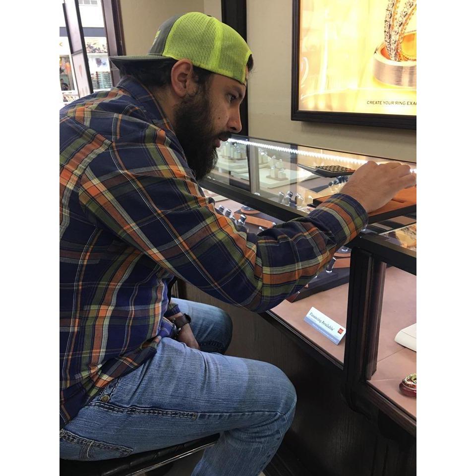Looking at rings with his sister!
