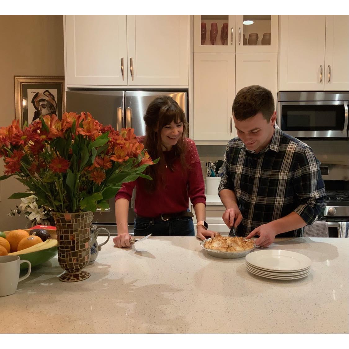 Dishing up our flapper pie, which we baked for one of our first family dinners with the van der Polls. One of our earliest photos!