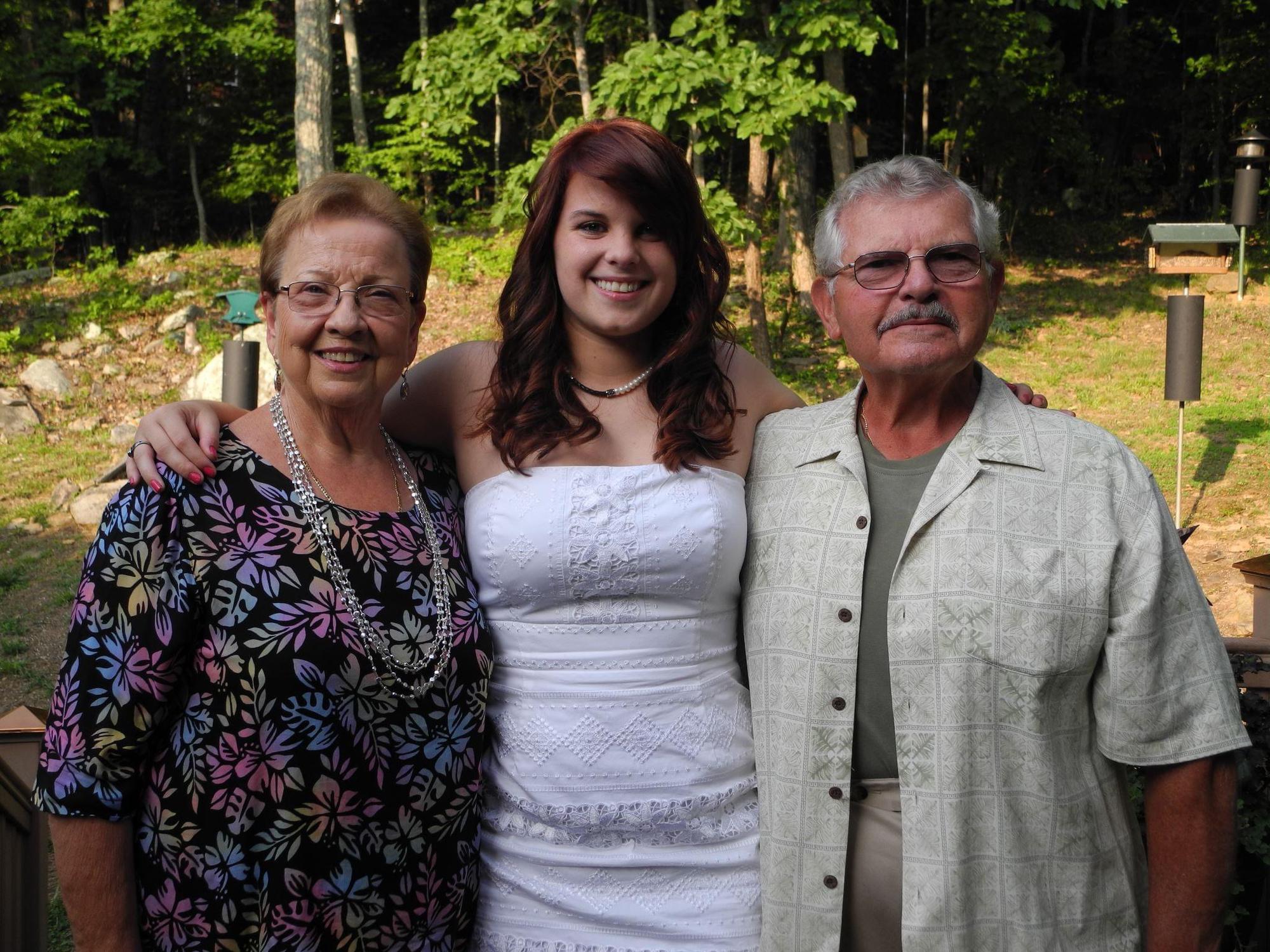 Nikki with Grandpa and Grandma Esch at High School graduation, 2012.