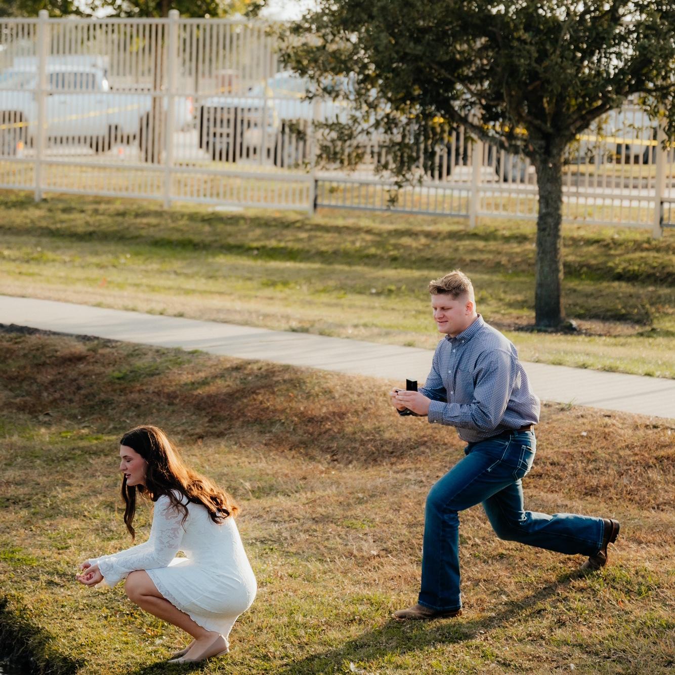 I was busy looking at the ducks, and Hunter was busy getting down on one knee. He knew this would be the perfect moment to distract me.