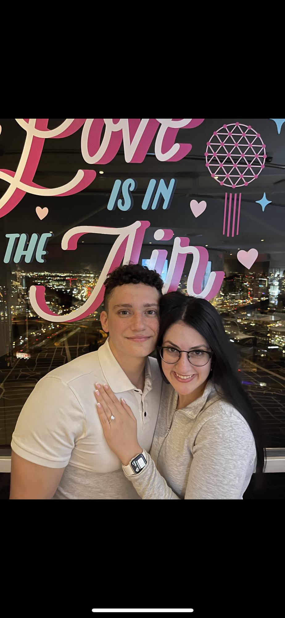 This photo was taken at the Dallas reunion tower after Mario proposed to Siena.