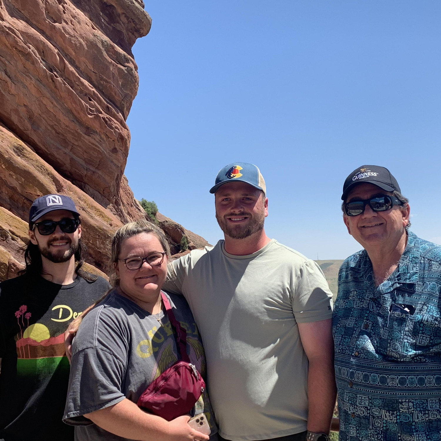 Jacob and Allison showing fellow concert lovers Red Rocks Amphitheater.