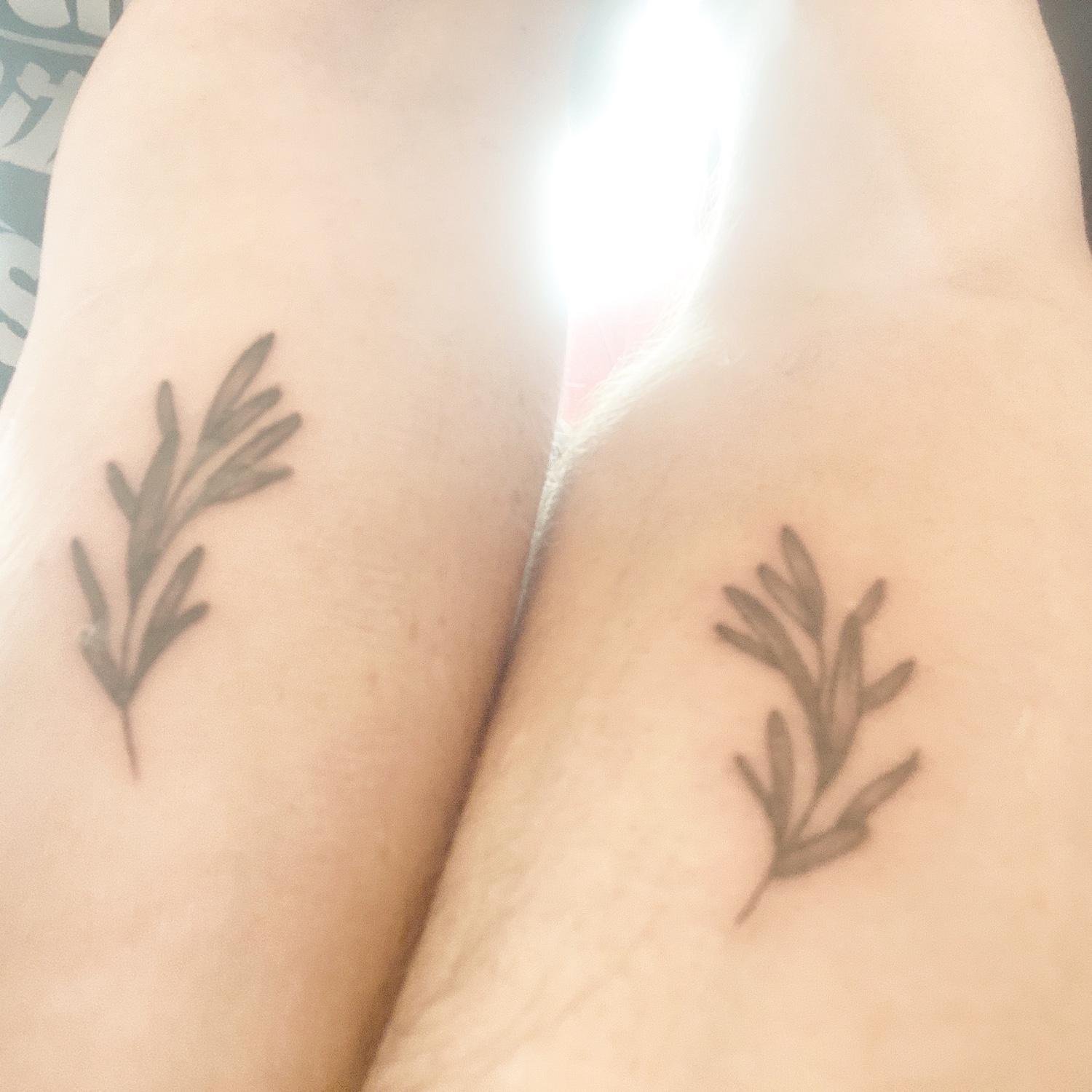 We got matching tats. Rosemary symbolizes commitment, love, and fidelity.