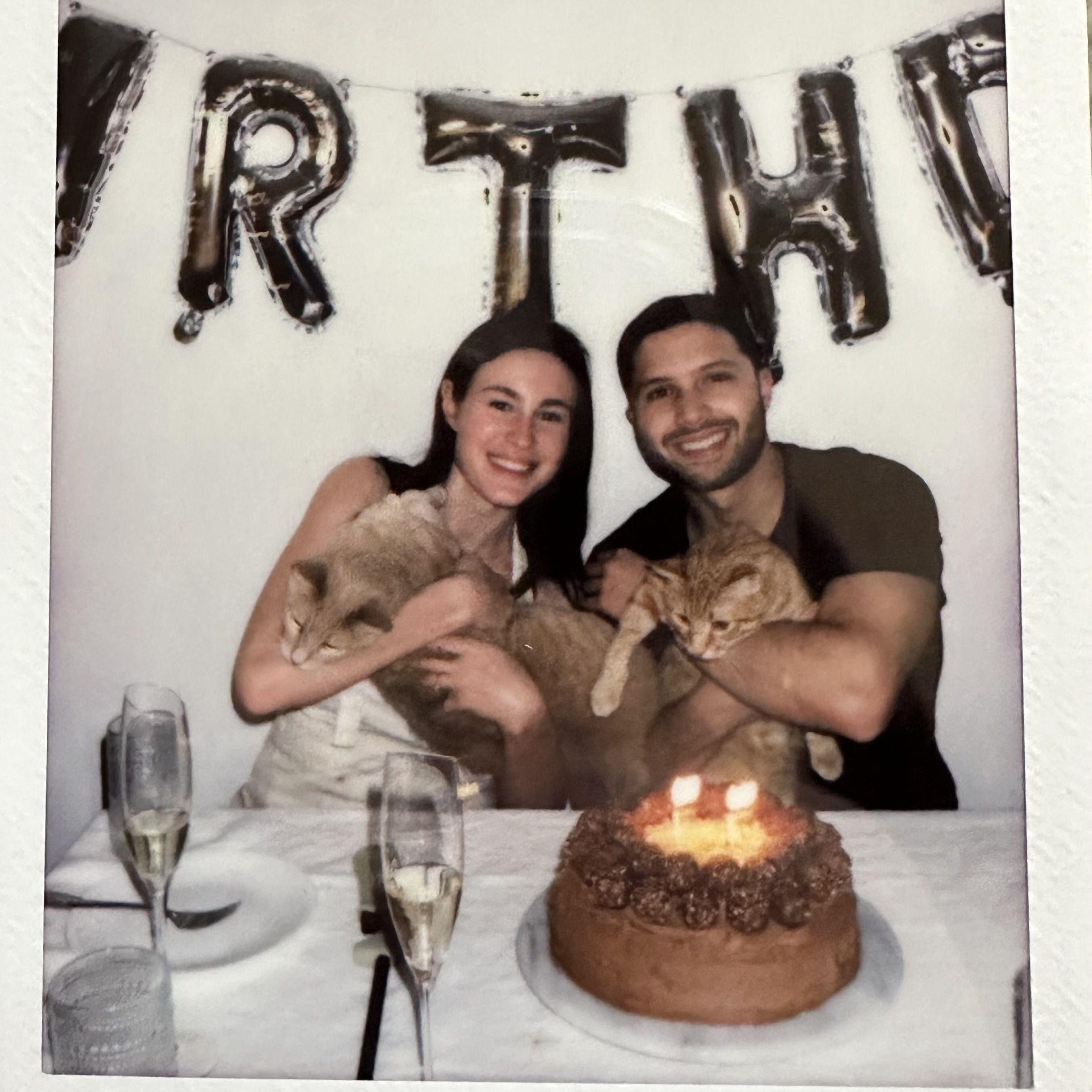 Us with our two fur children and absolute loves of our lives, Papu and Leo.