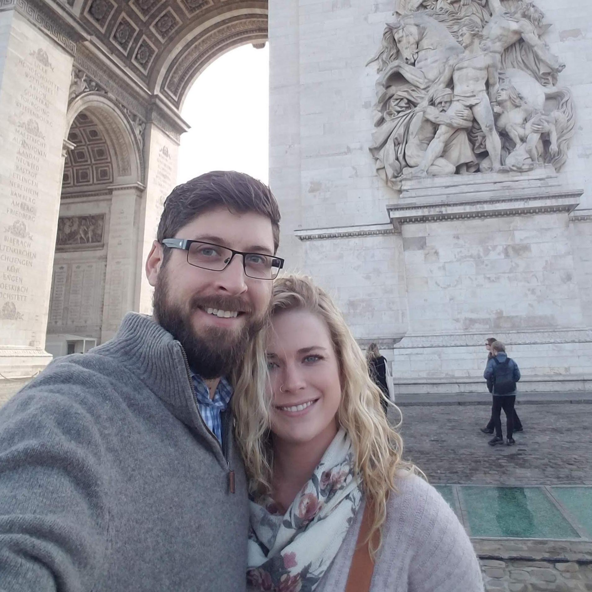 Visiting the Arc de Triomphe with coffee and croissants