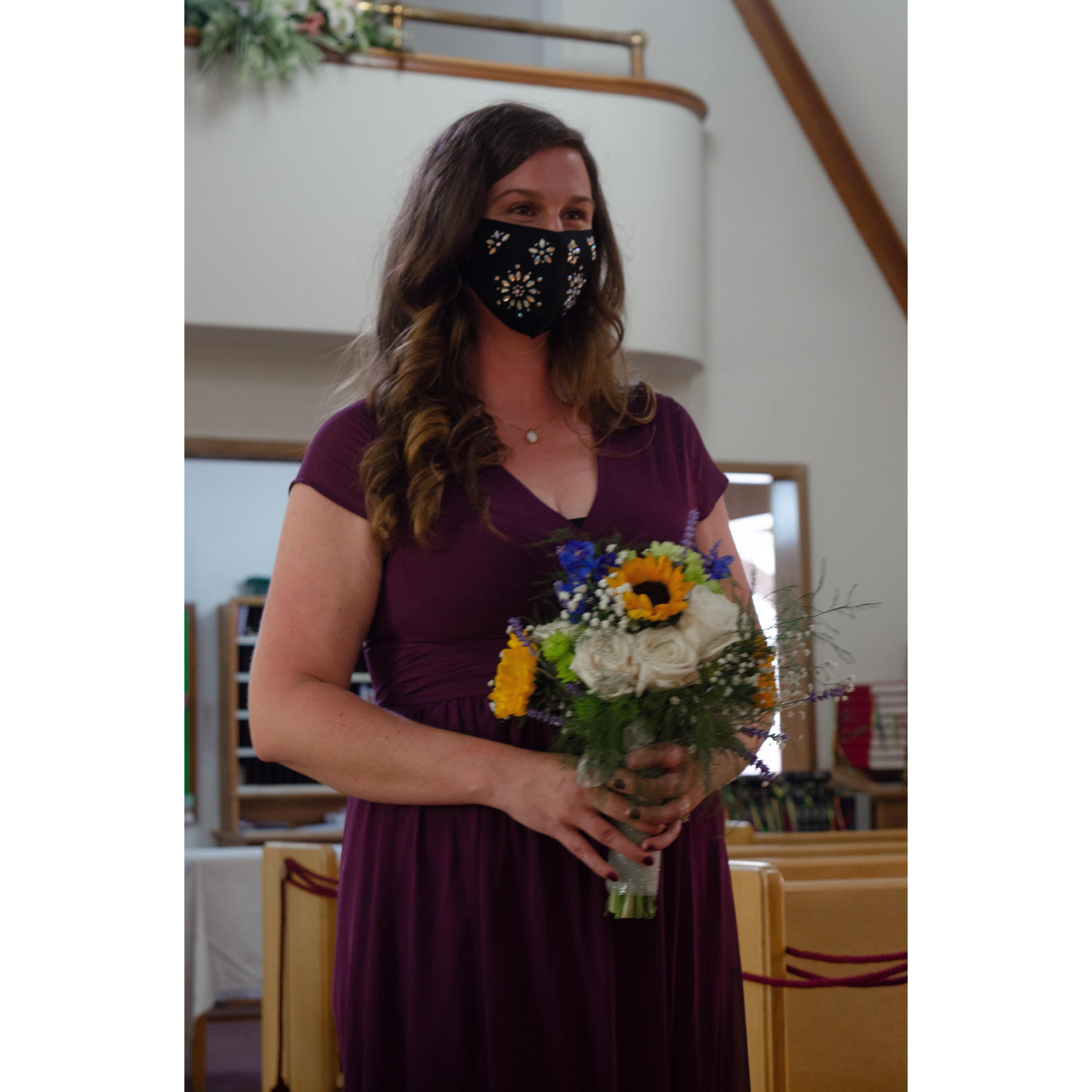 Melissa beginning the procession down the isle while our organist played Pachelbel's Cannon in D.