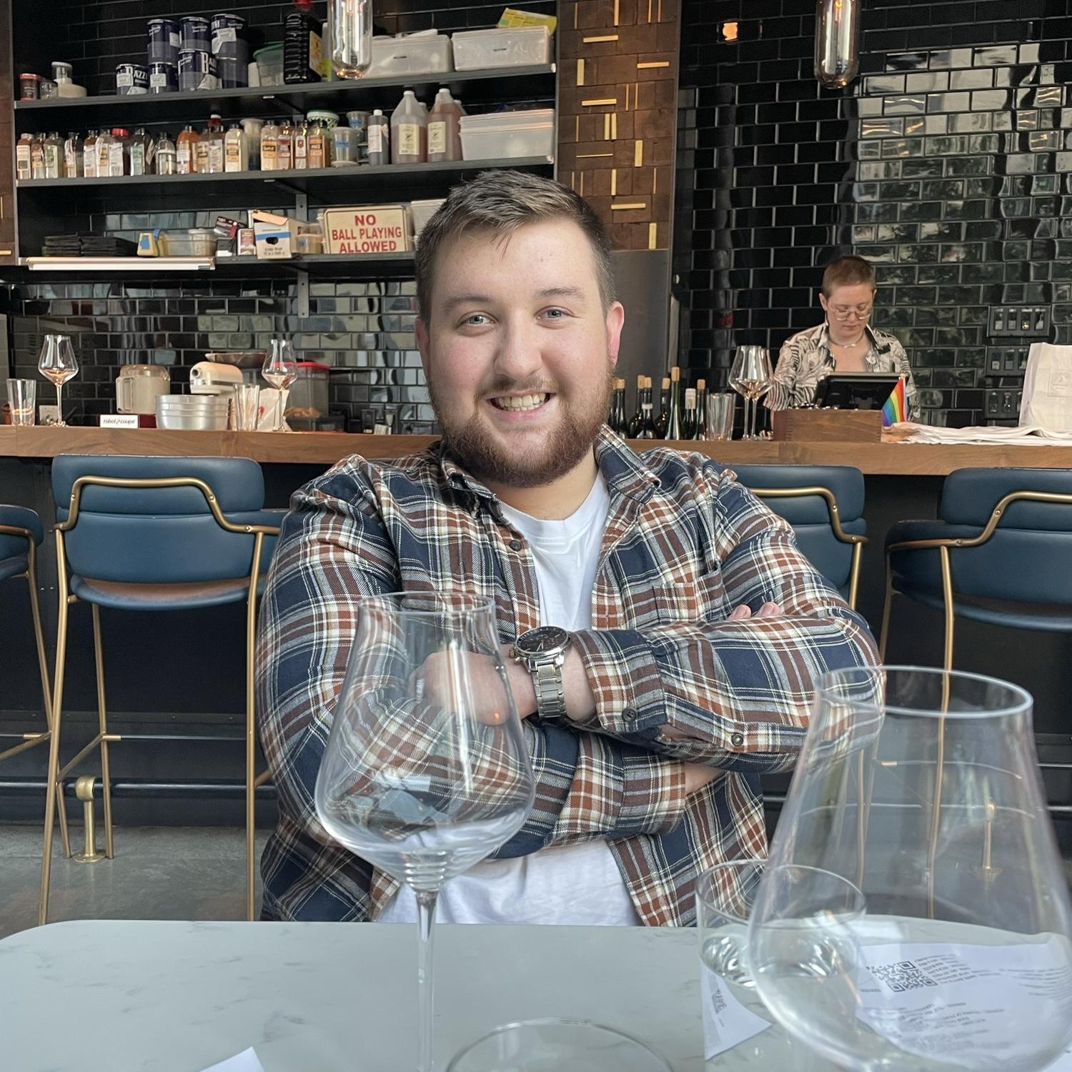 Handsome man in Boston at a wine bar where his connections in Scotland managed to get us free drinks.