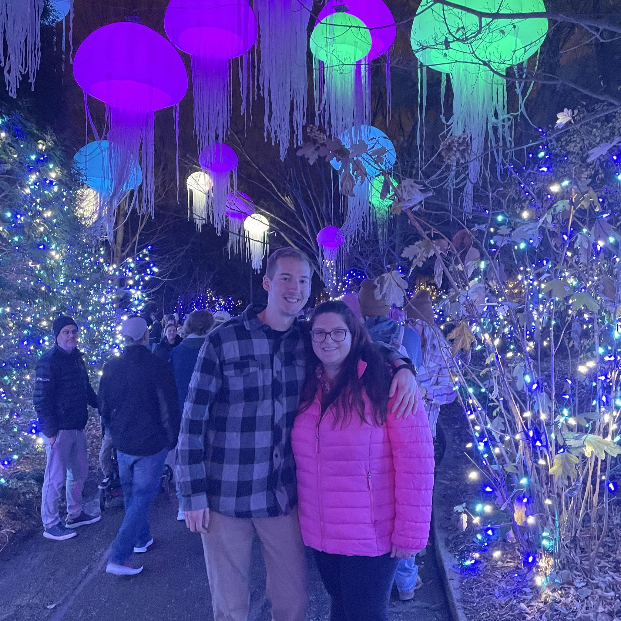 Walking through the array of lights at the zoo, posing for a picture!
12-09-2022