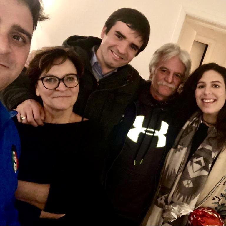 Dec 2018: This photo documents the first time Maddy tasted Davide's Aunt Sandra's torta fritta. Here we are with the master chef as well as Davide's cousin, Jack, and uncle, Mauro.