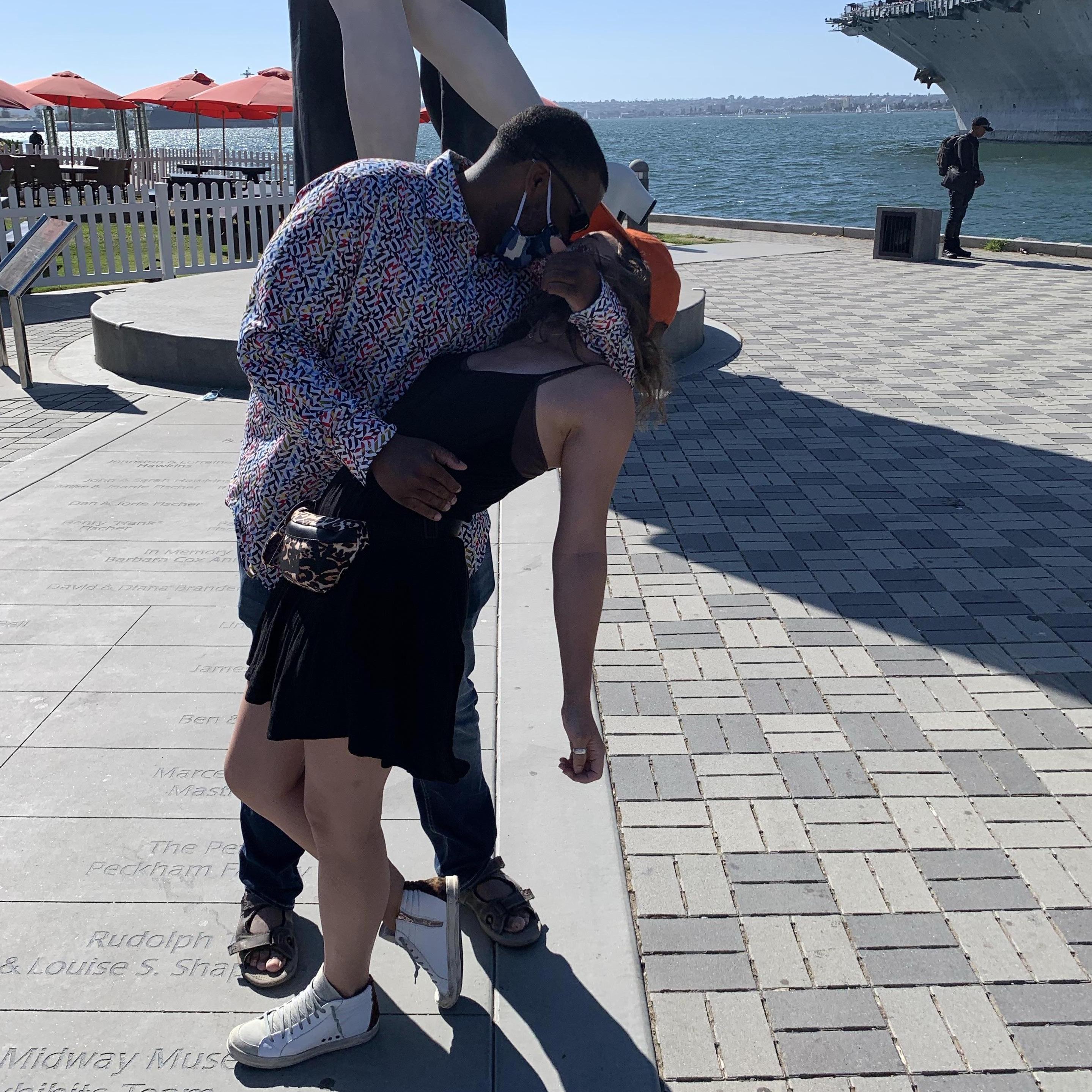 Dip kiss like the famous statue in San Diego