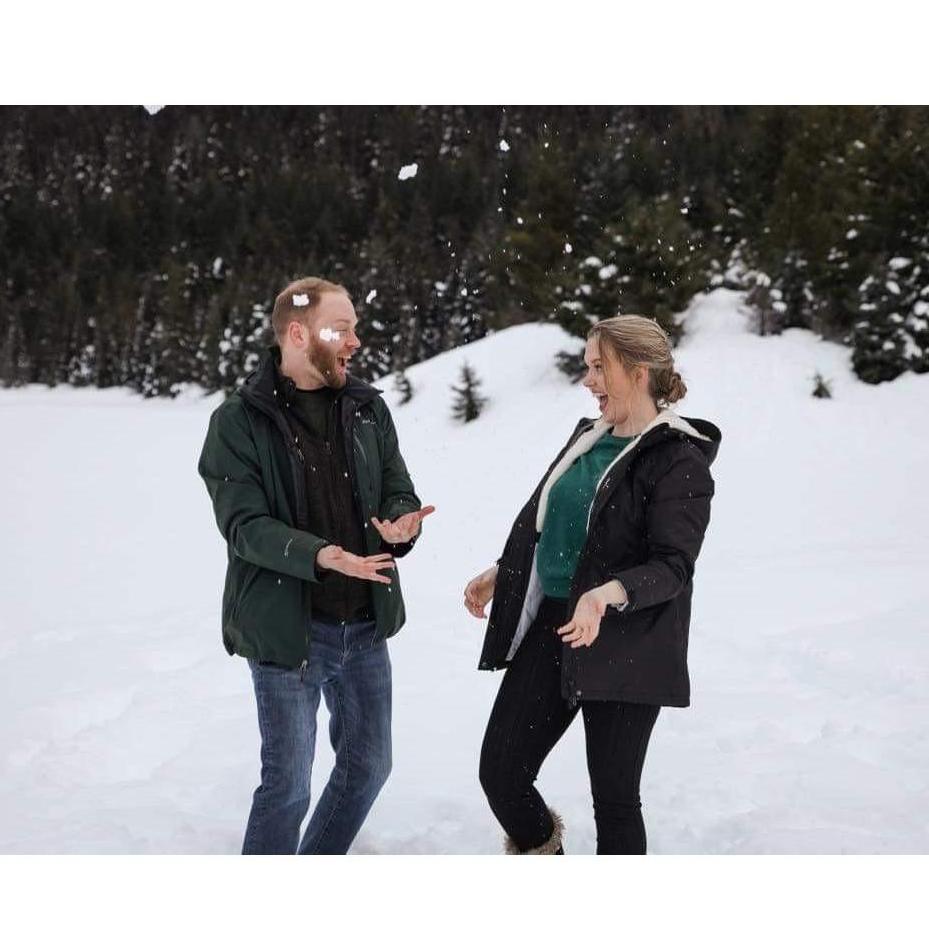 Playing with snow for our engagement pictures! February 2021