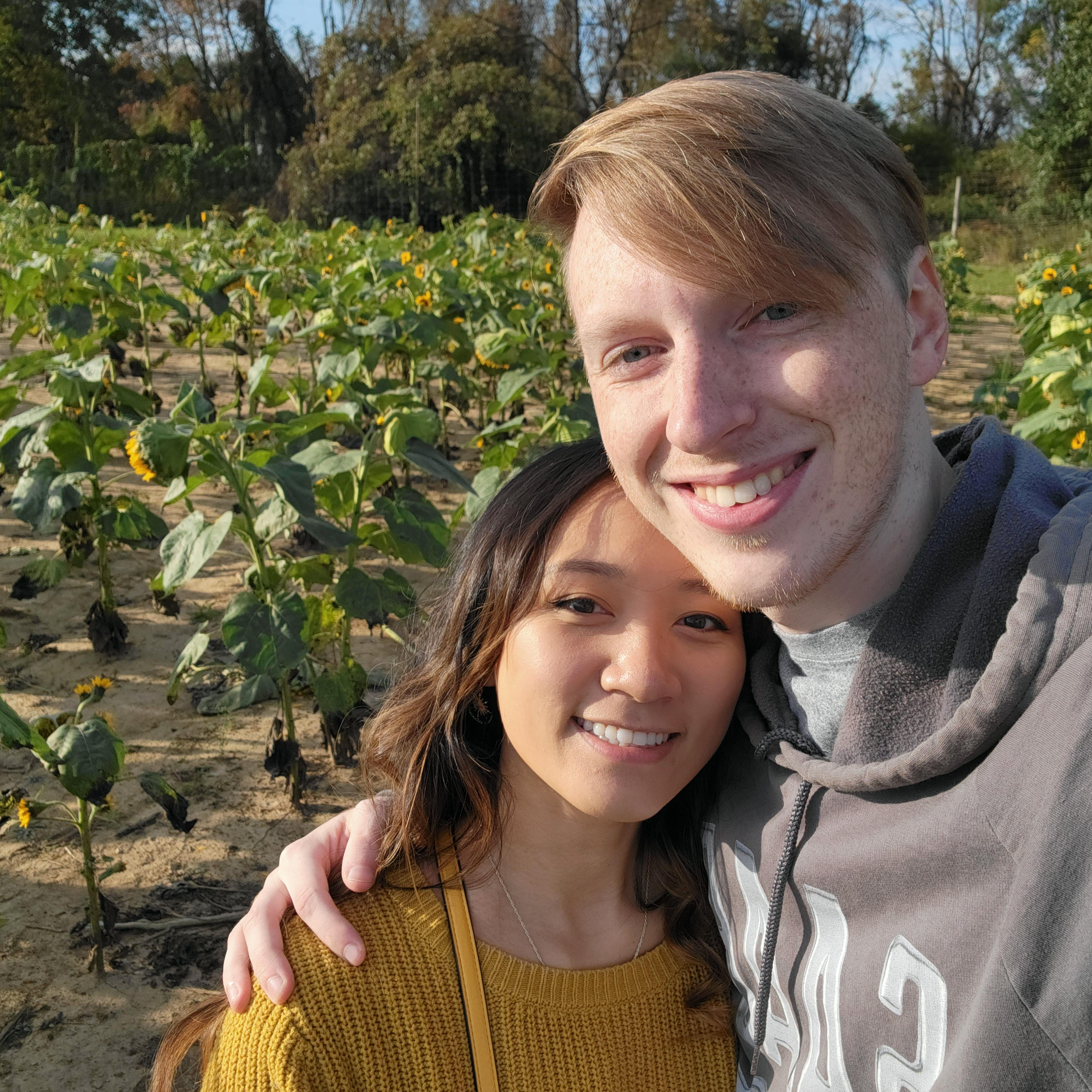 One of our first dates together. We were at Shadybrooke farms for their Fallfest in one of the Sunflower fields.