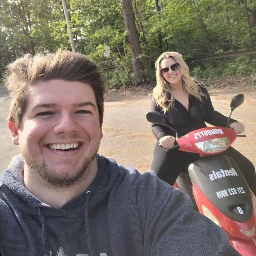 Adventuring on mopeds around Silver Lake Sand Dunes.