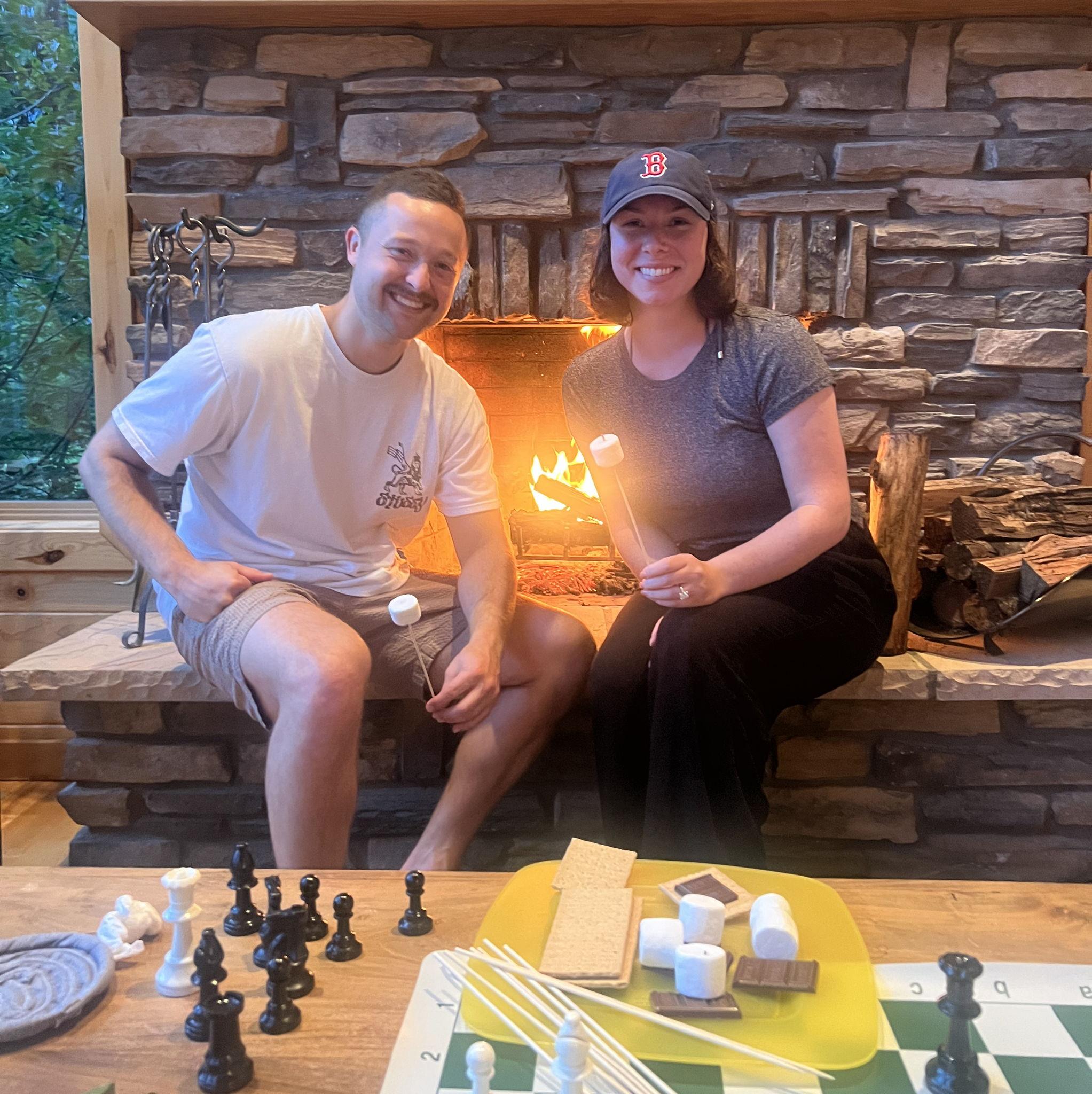 Roasting smore's with some friends on the trip where we got engaged!