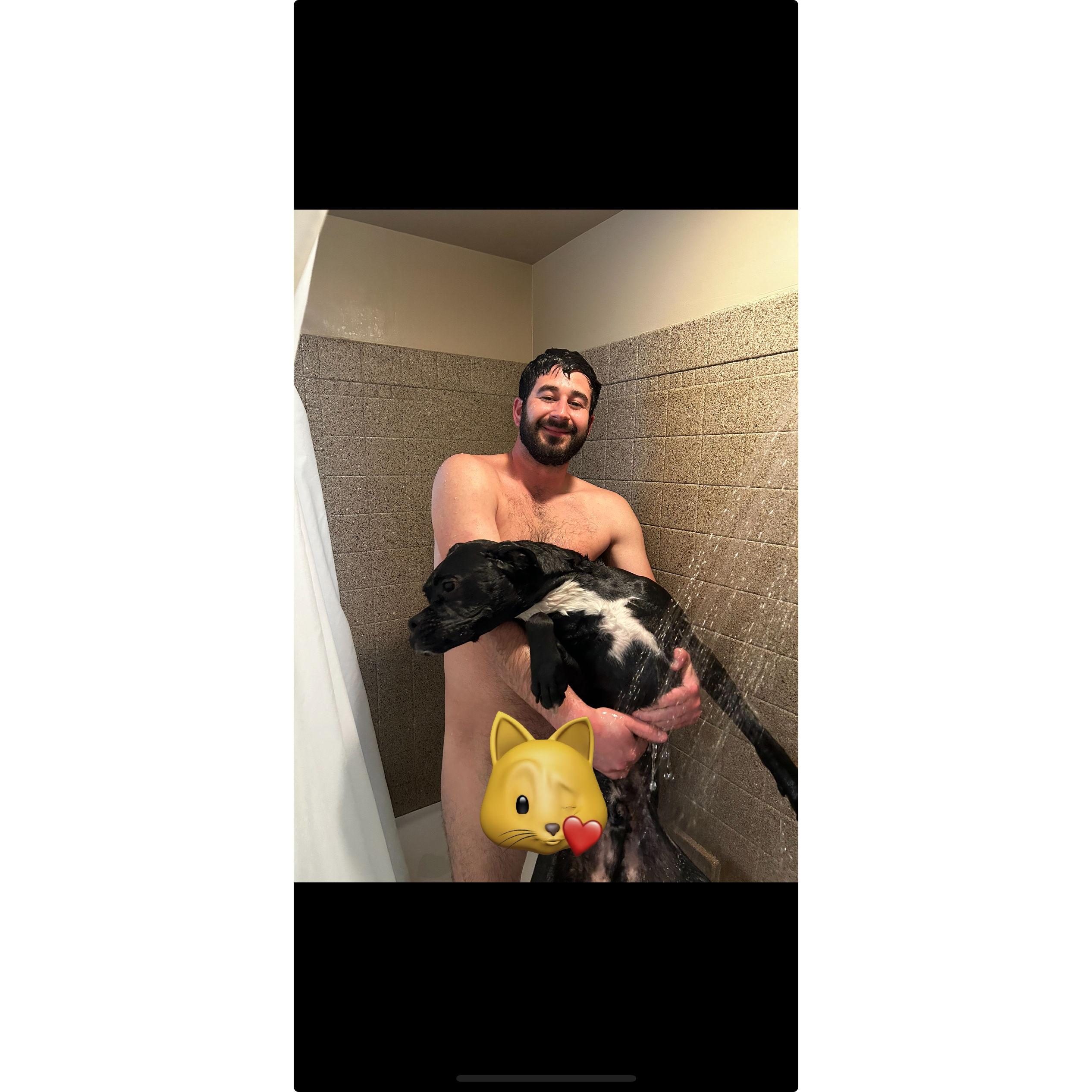 saul rolled in poop. he hates the shower. papa pete showered with the boy.