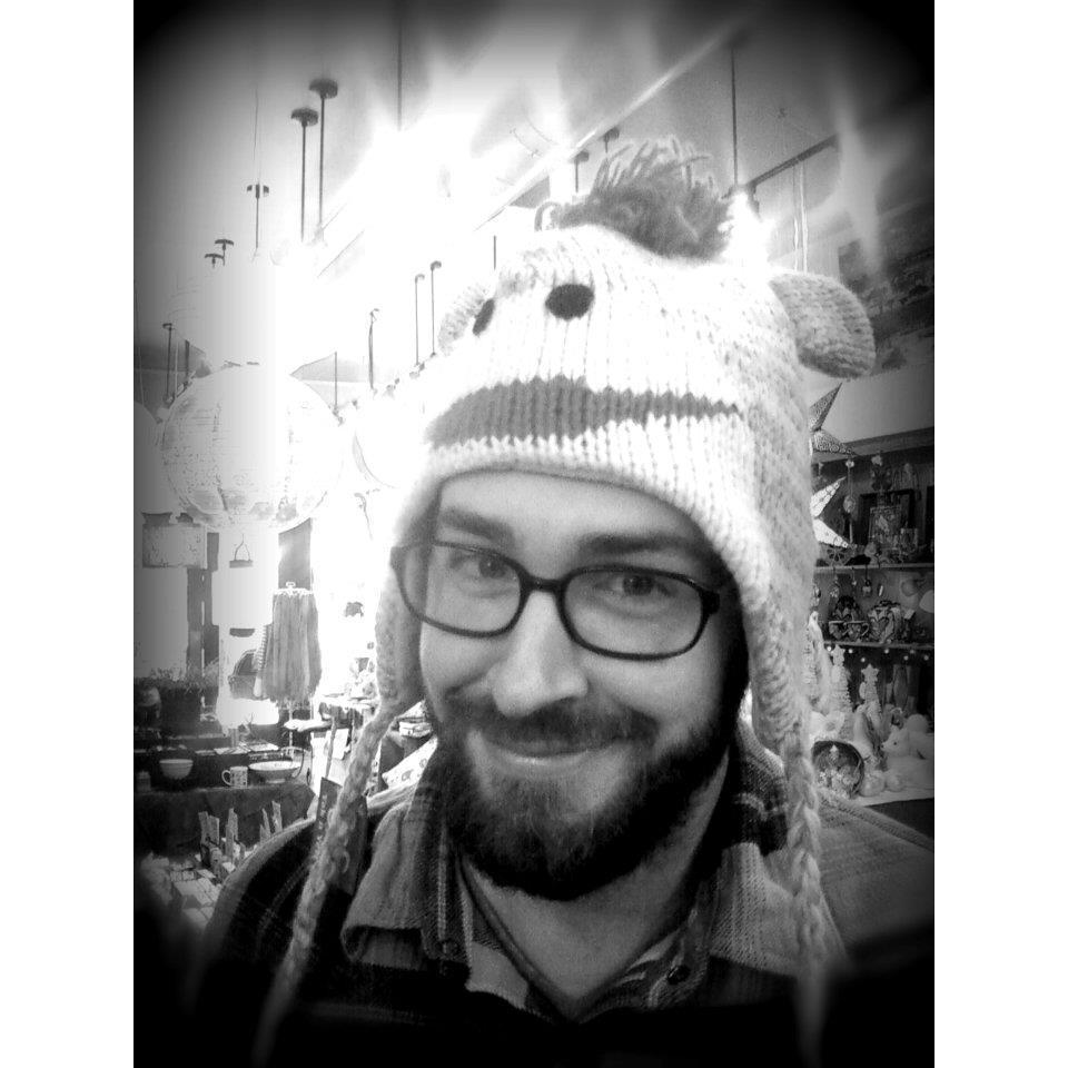 Cute little monkey...trying on hats again!