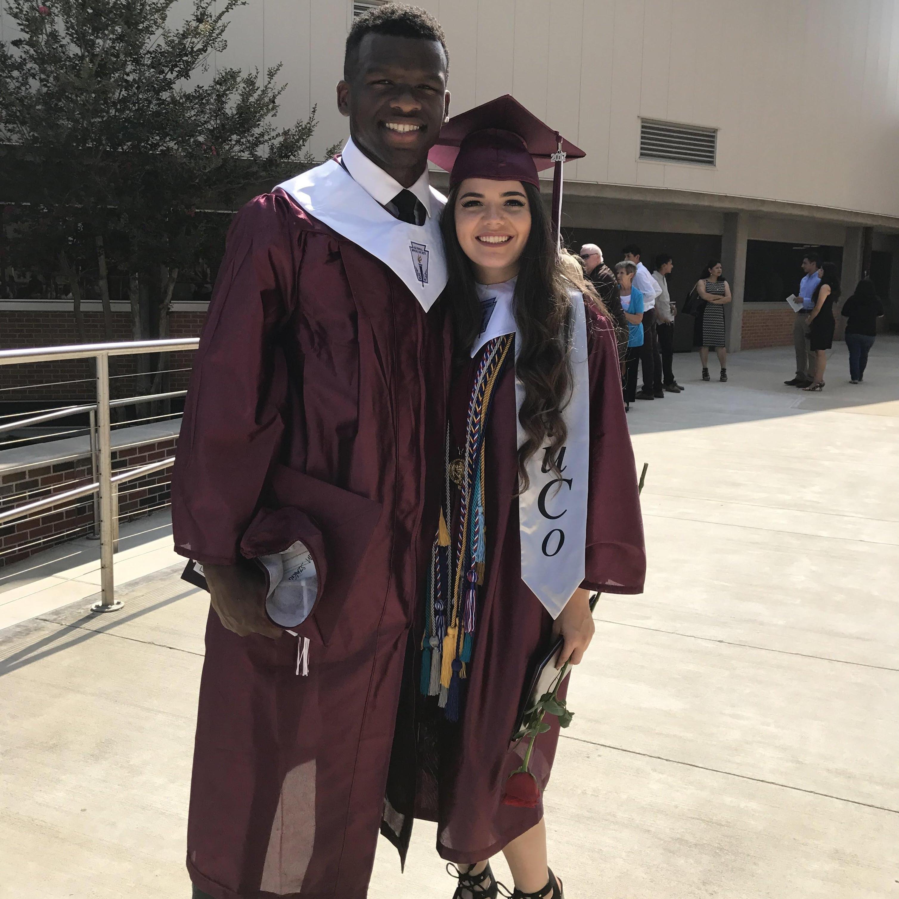 High school graduation photo right after our ceremony :,)