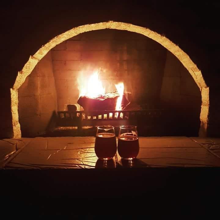 Enjoying our first night in our new home by the fireplace.