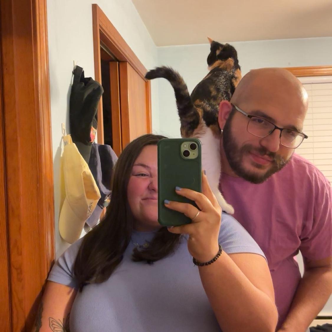 We’ve adopted two kittens together; in total we have 2 dogs, 2 cats, and a lizard!