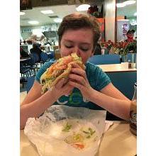 Our oldest daughter, Courtney (14), having a Gyro for the first time!  She loved it!  Even though she be little, she can eat that whole thing!