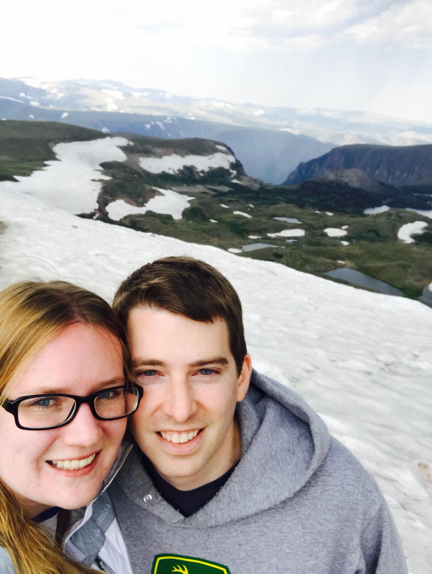 We took a trip to Yellowstone and beyond. This is our picture from on top of the world on Beartooth Pass.