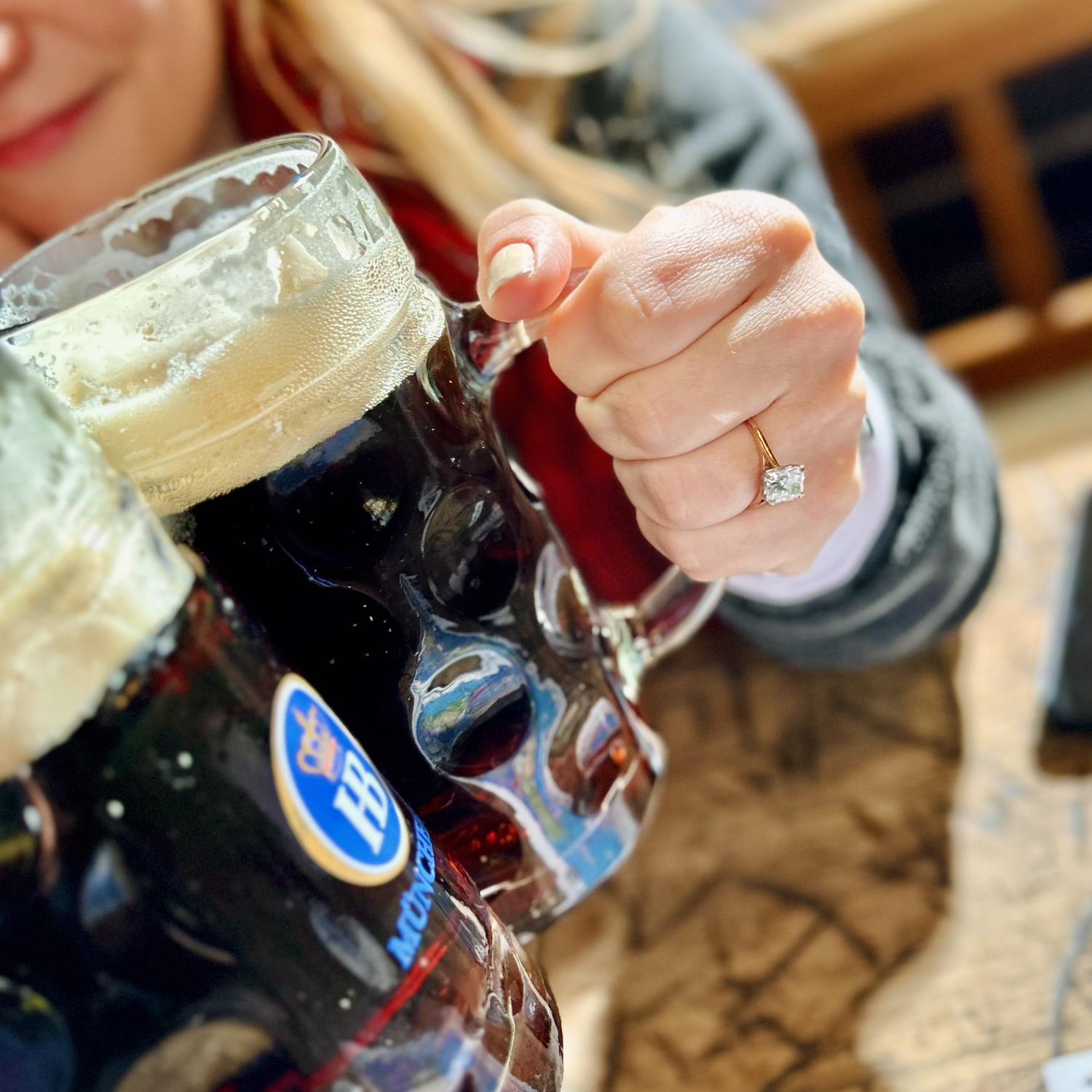 Cheersing to being fiancés at Hofbrauhaus in Munich