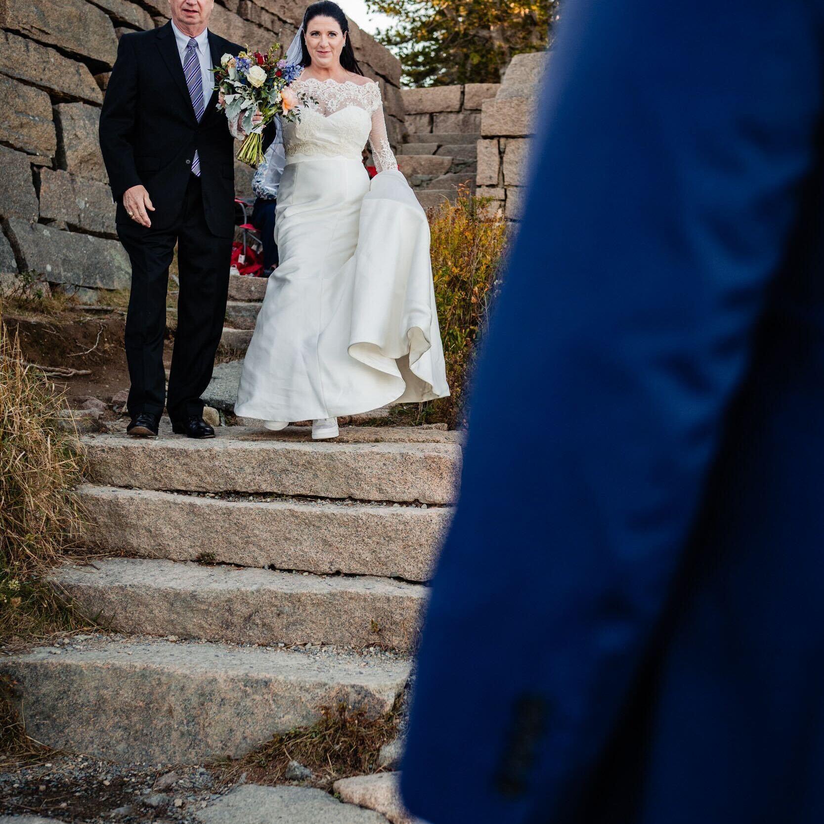 Elizabeth's father, Henry, walked her down the steps.
