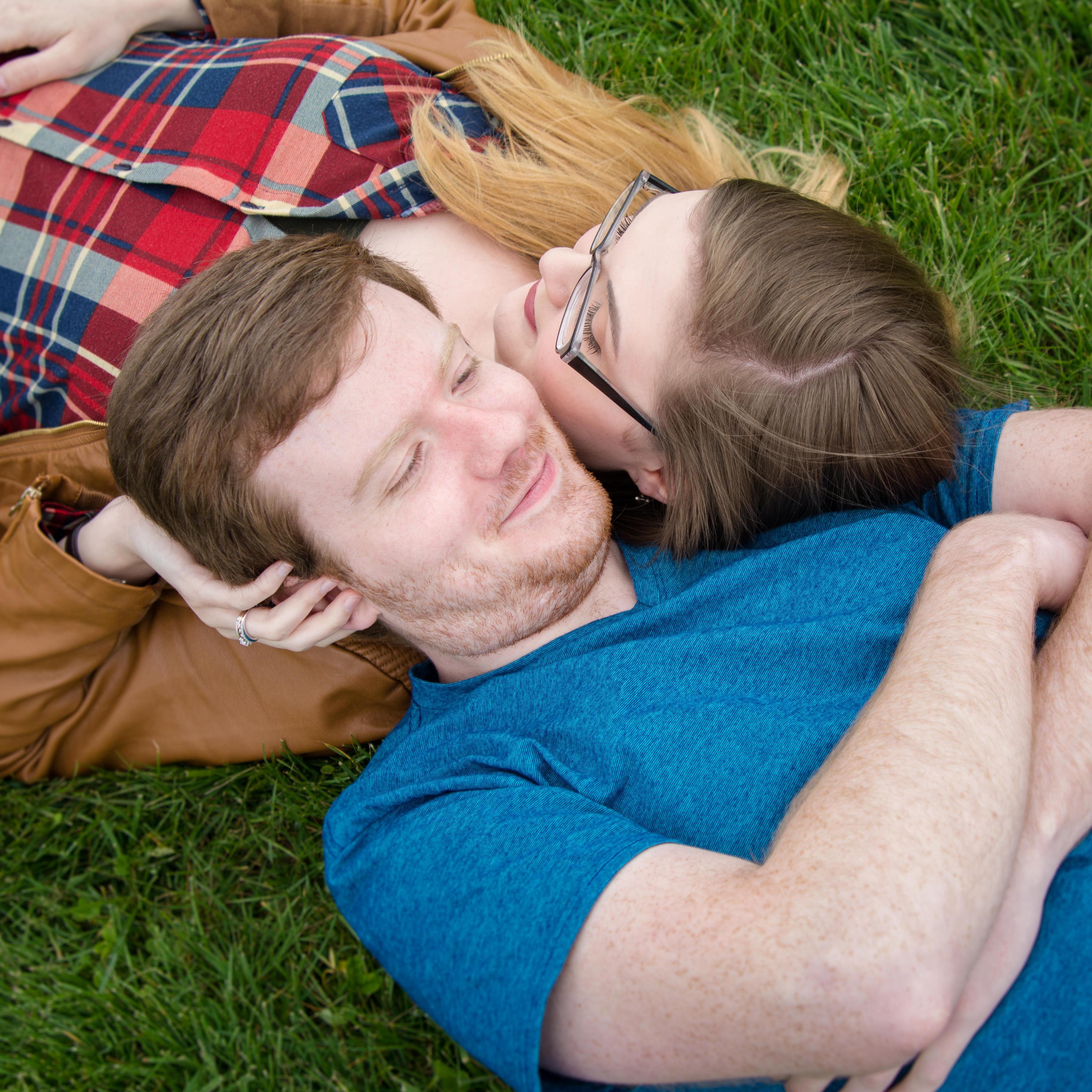All engagement photos were done in locations with significance to Julia and Greyson's relationship. This photo was taken in a field just outside of the building where they worked together.
