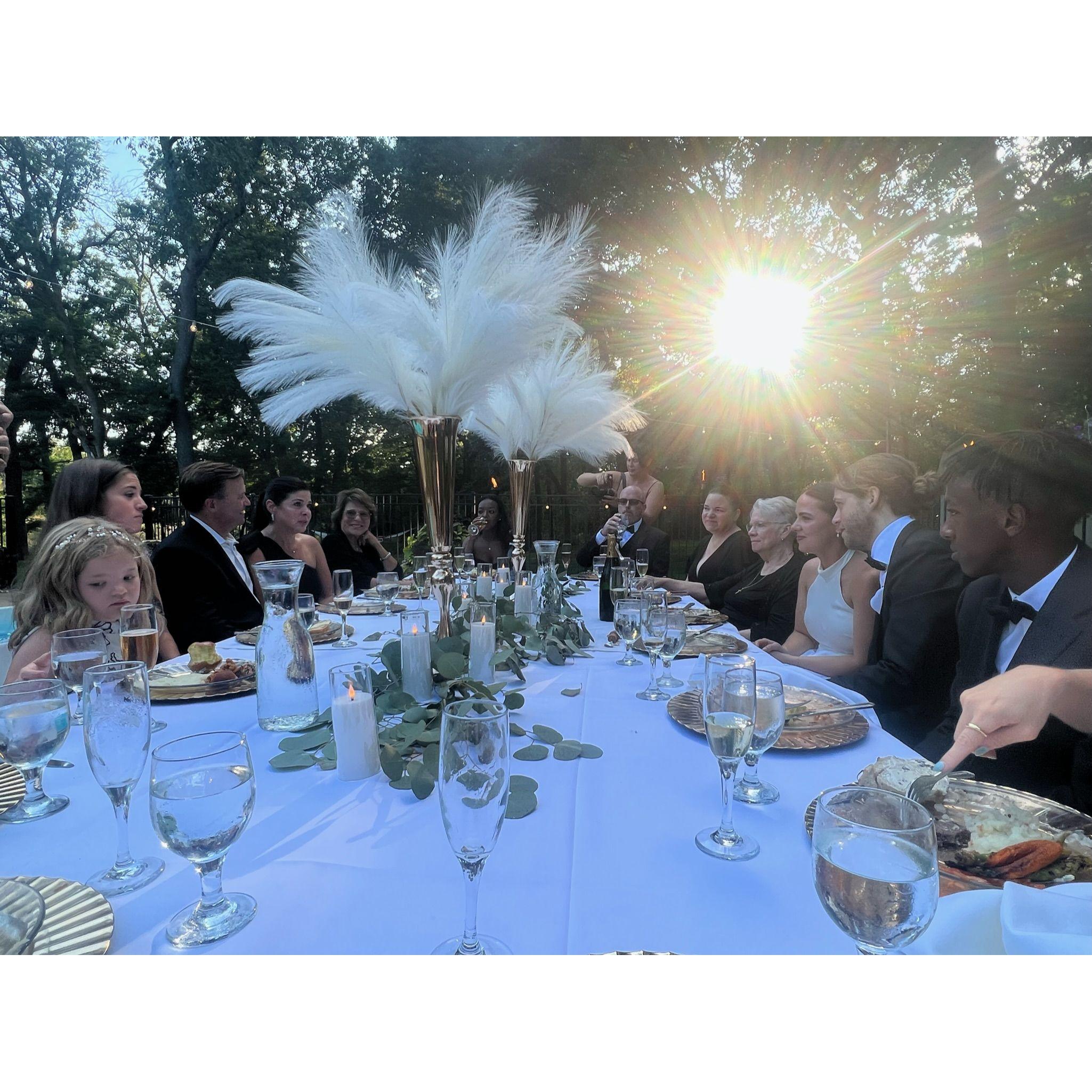 A beautiful backyard dinner with family - poolside.
