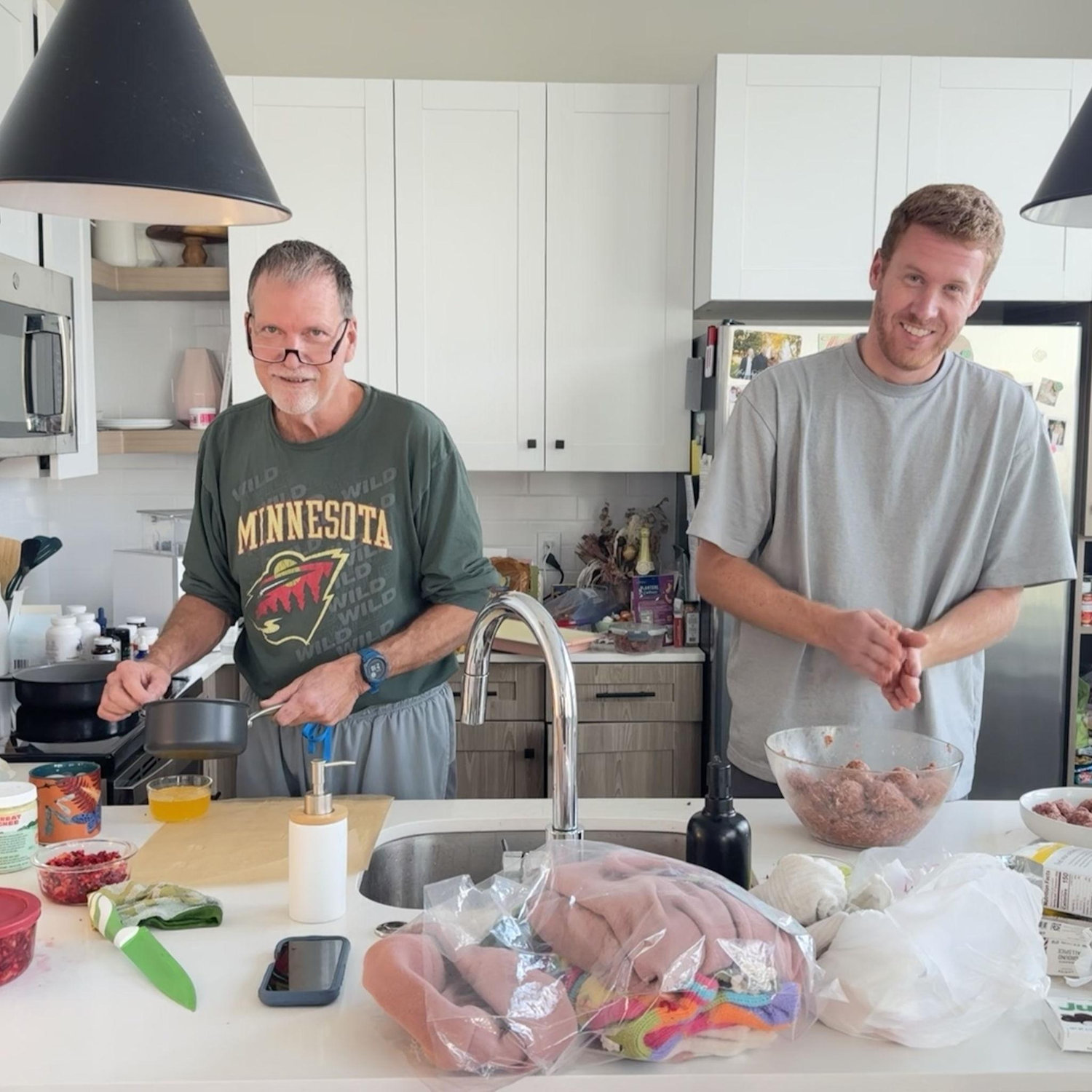 Dad and Trent make Christmas meatballs