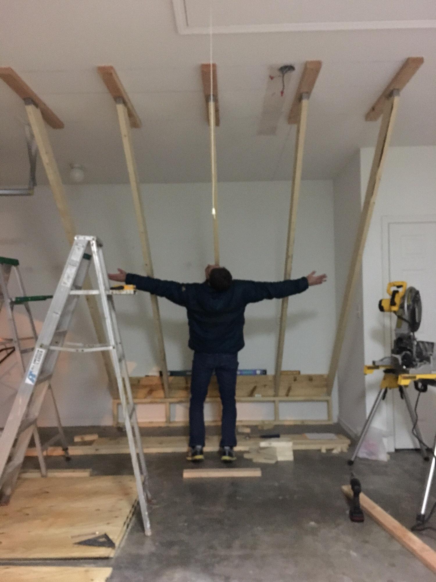 This was definitely part of the 'nesting' phase of purchasing a home - building the home climbing wall!