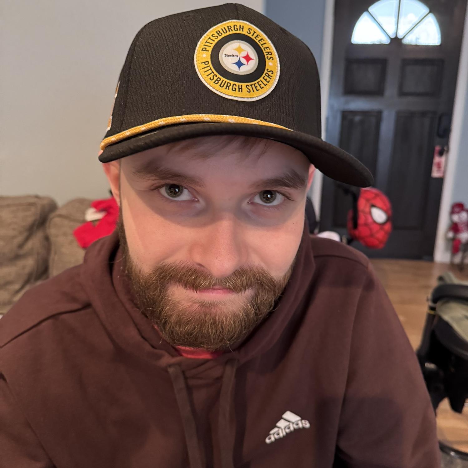 One of us was not as excited to get a Steelers hat for Christmas!