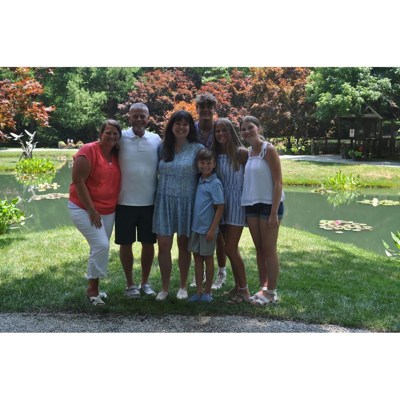 Macy's family celebrating the engagement.