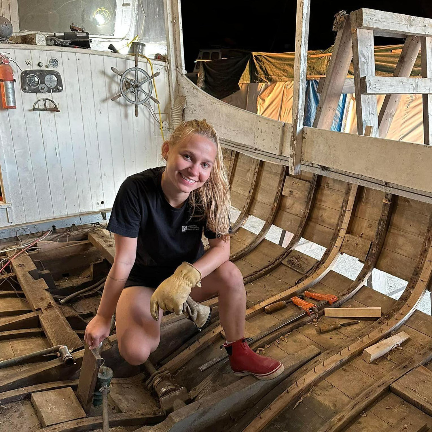 Flannery helping Gordon work on Dobbin in Penobscot, in April of 2023.