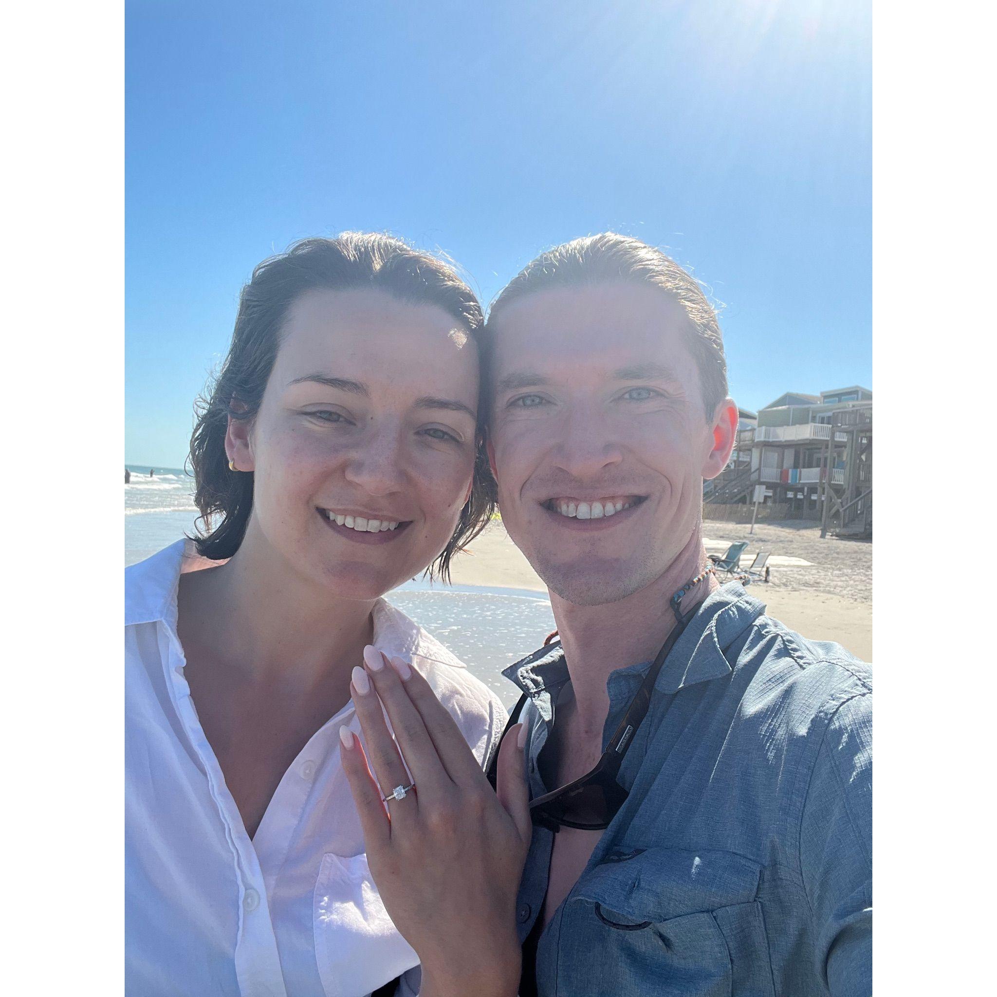 Newly engaged at Topsail Beach on June 24, 2022 -- our 4th anniversary!