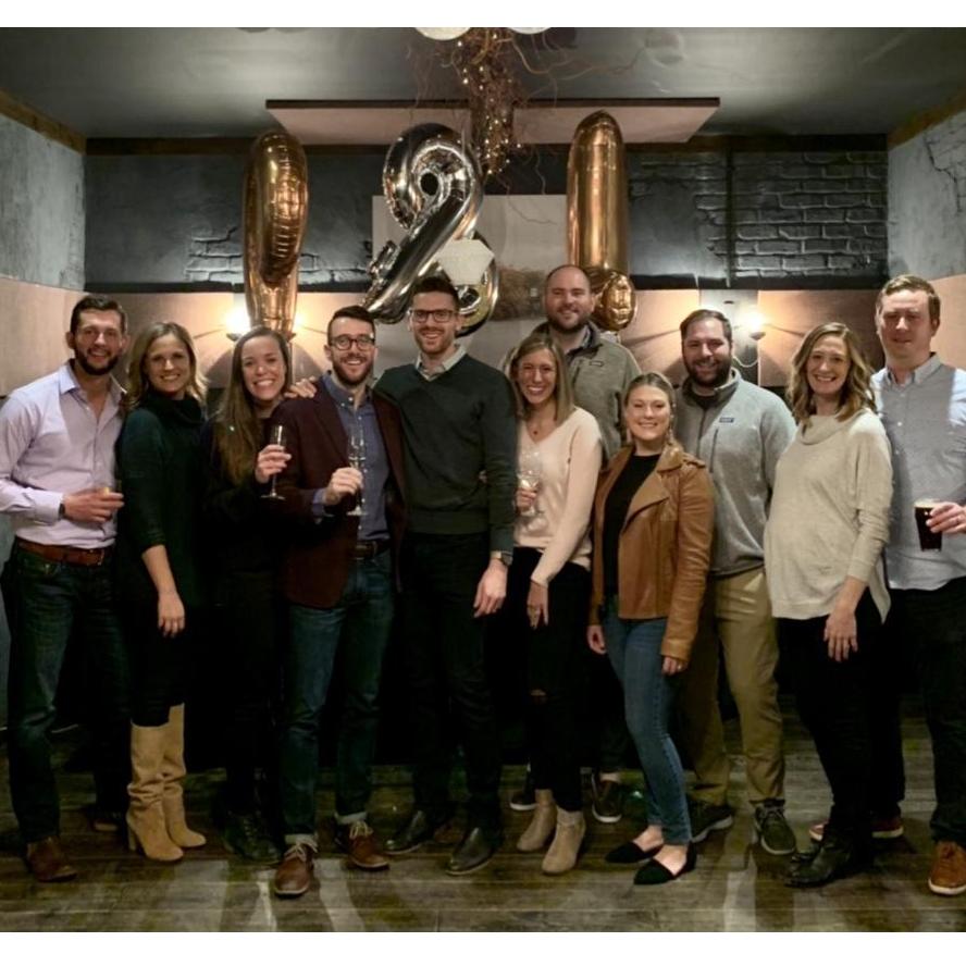 Celebrating our engagement in Chicago with UD friends