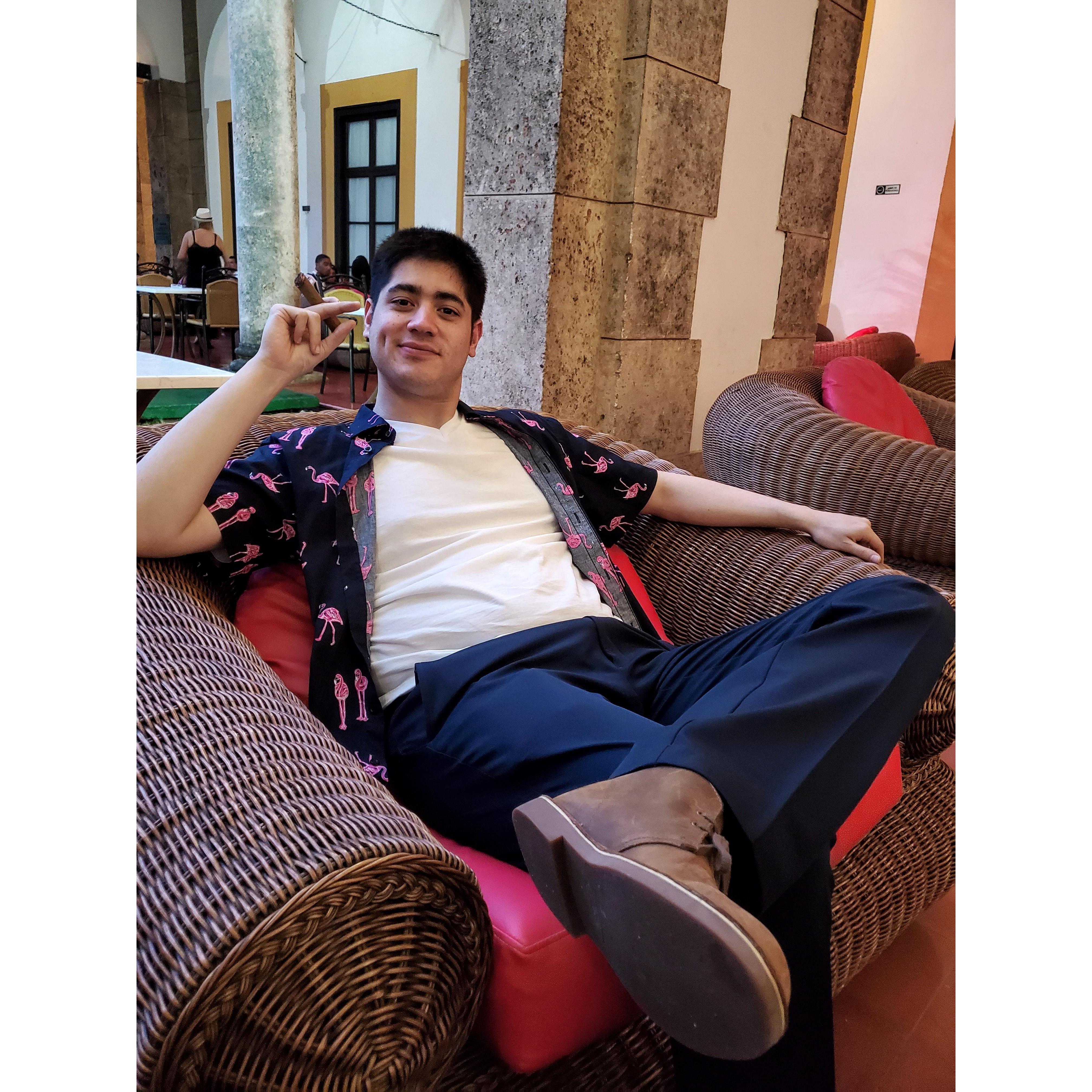 Smoking cigars and drinking mojitos; living la vida Cuba