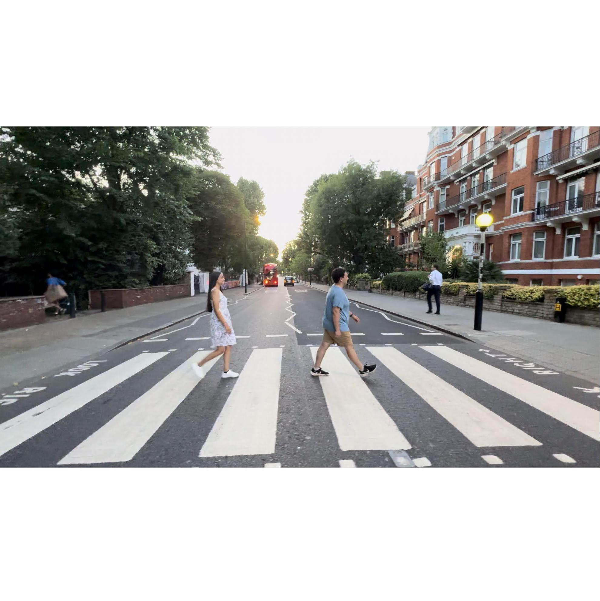 Walking across Abbey Road.