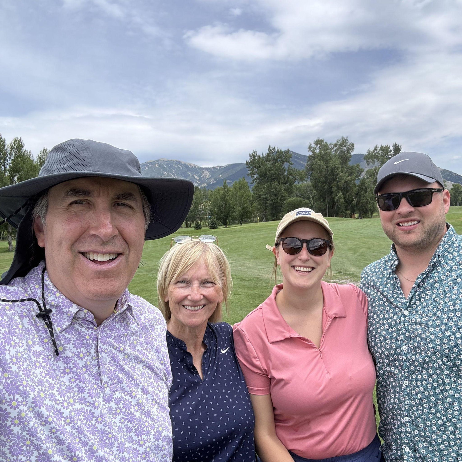 Getting our butts kicked golfing with Haley's parents
