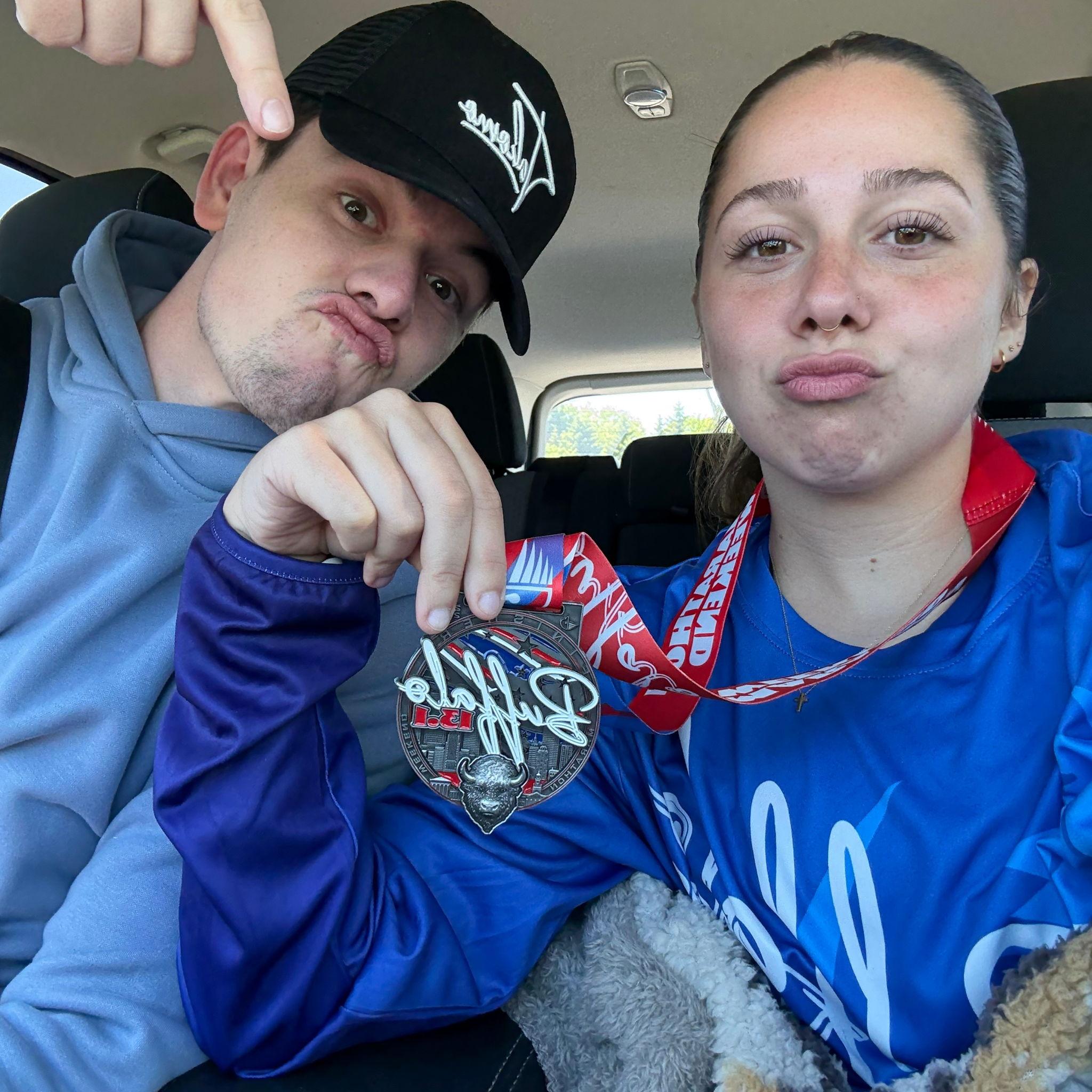 Madi ran the Buffalo half marathon as Michael cheered her on!