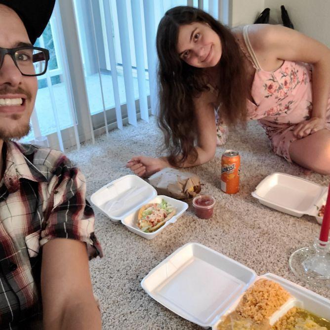 Here we are enjoying dinner on the floor of our apartment the day we moved in! Fun fact: we recreated this night for our one year anniversary of living together 😊