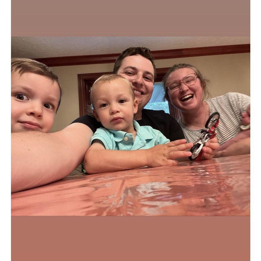 Abbi and Uncle David hanging with the kids at family dinner.