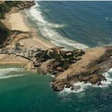 Catch the sunset at Pedra do Arpoador