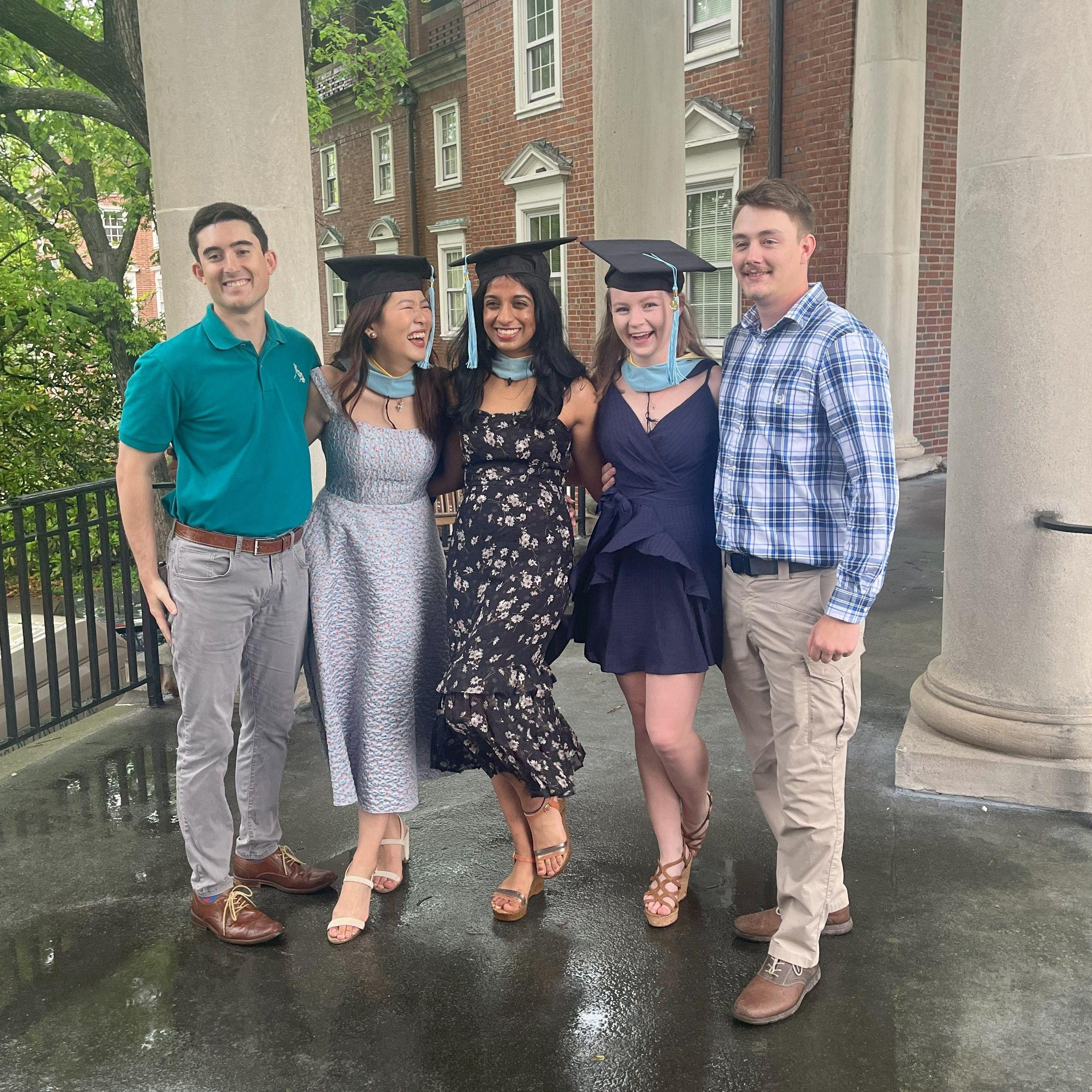 Taylor graduated with her master's degree in special education on a rainy Saturday. Neeraja and Lillian were two of the first people in Taylor's life to know about and meet Brandon.