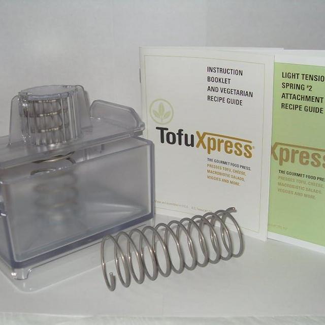 Gourmet Tofu Press/Food Press - Clear - w/Light Tension Attach. TofuXpress removes moisture from tofu, yogurts, and more automatically.