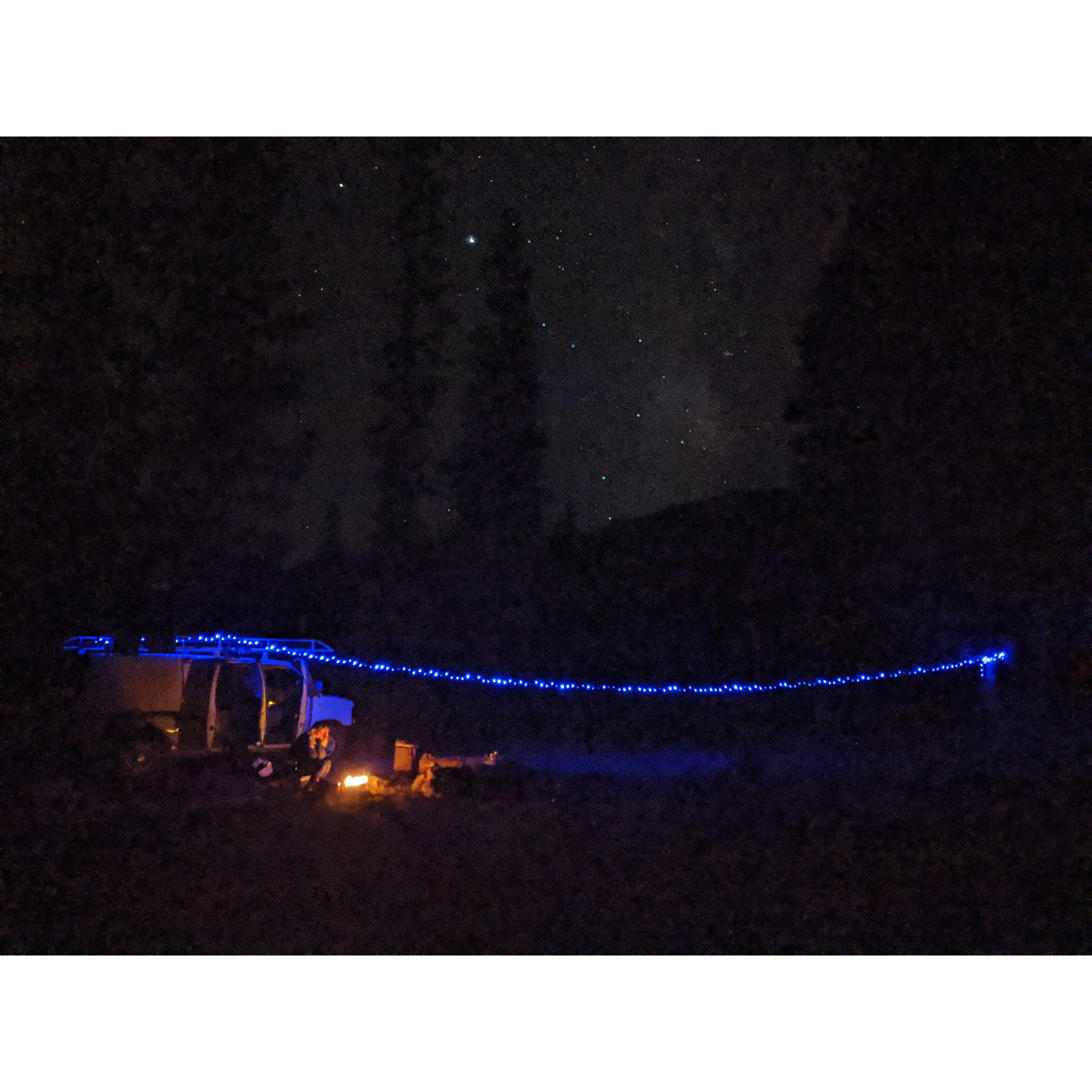 Van camping under the stars.